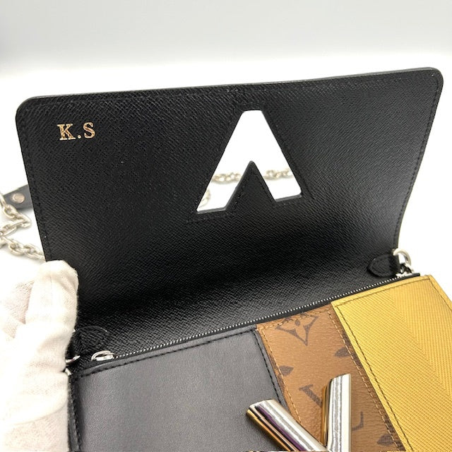 ルイヴィトン モノグラム リバース ツイストMM チェーン 長財布