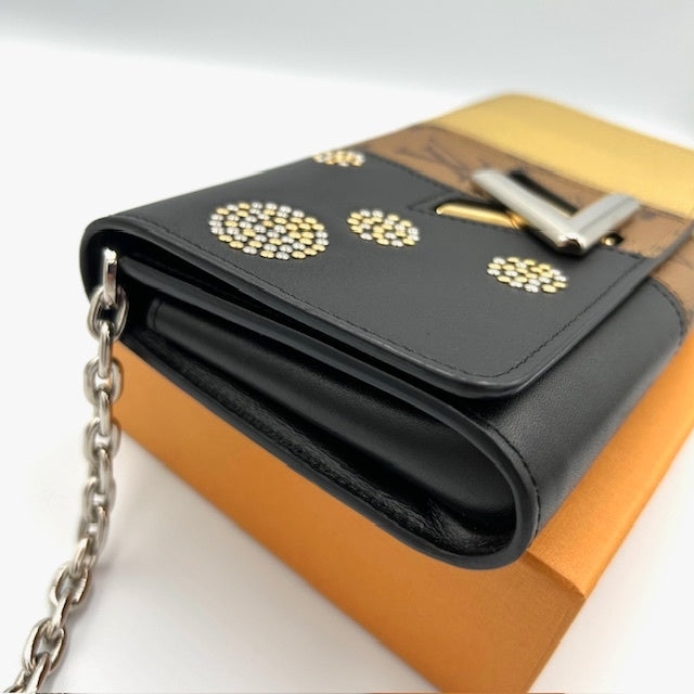 ルイヴィトン モノグラム リバース ツイストMM チェーン 長財布