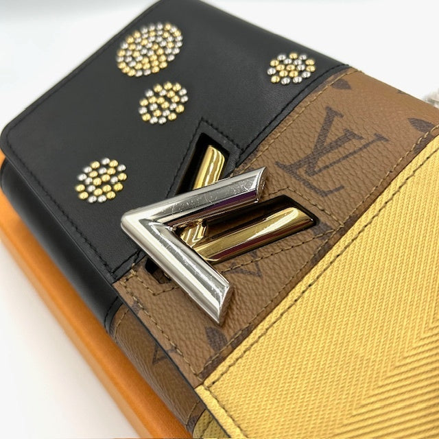 ルイヴィトン モノグラム リバース ツイストMM チェーン 長財布